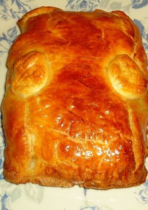 Una foto de Napolitana de atún y aceitunas