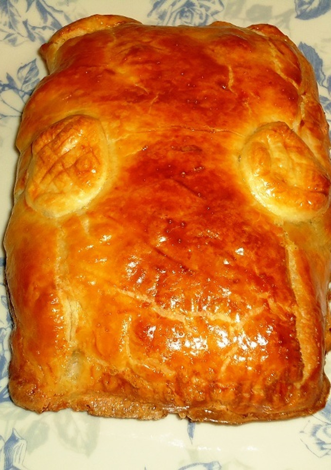 Una foto de Napolitana de atún y aceitunas