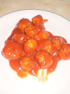 Una foto de Bolitas de merluza con gambas