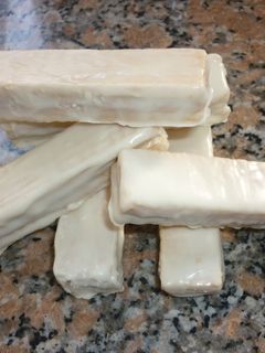 Una foto de Obleas rellenas cubiertas de chocolate