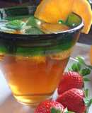 Refresco de té earl grey con naranja y melisa