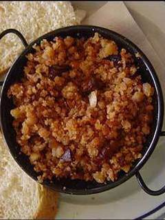 Una foto de Migas con sardinas
