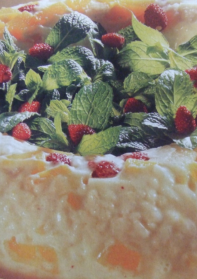 Una foto de Arroz dulce con melocotón y fresitas del bosque