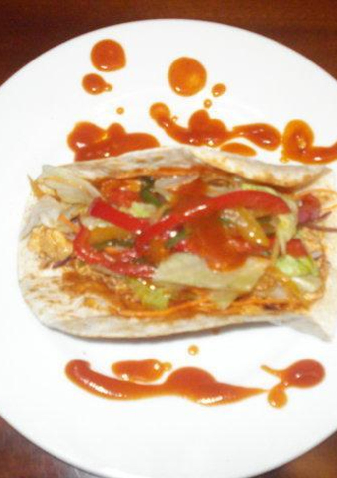 Una foto de Fajitas de pollo con salsa picante de tomate