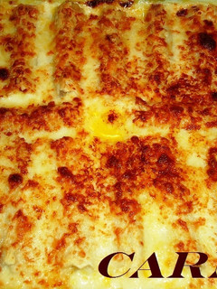 Una foto de Canelones con mousse de oca