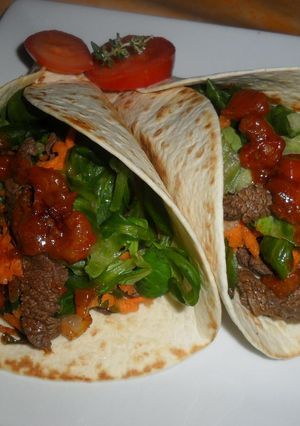 Una foto de Fajitas de ternera con salsa agridulce de vermut