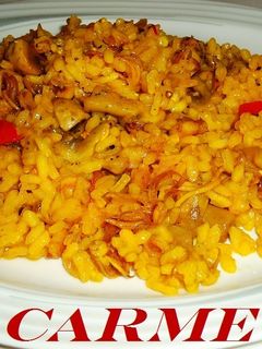 Una foto de Arroz con chipirones y champiñones