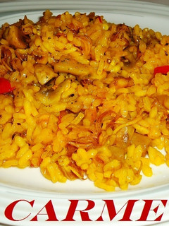 Una foto de Arroz con chipirones y champiñones