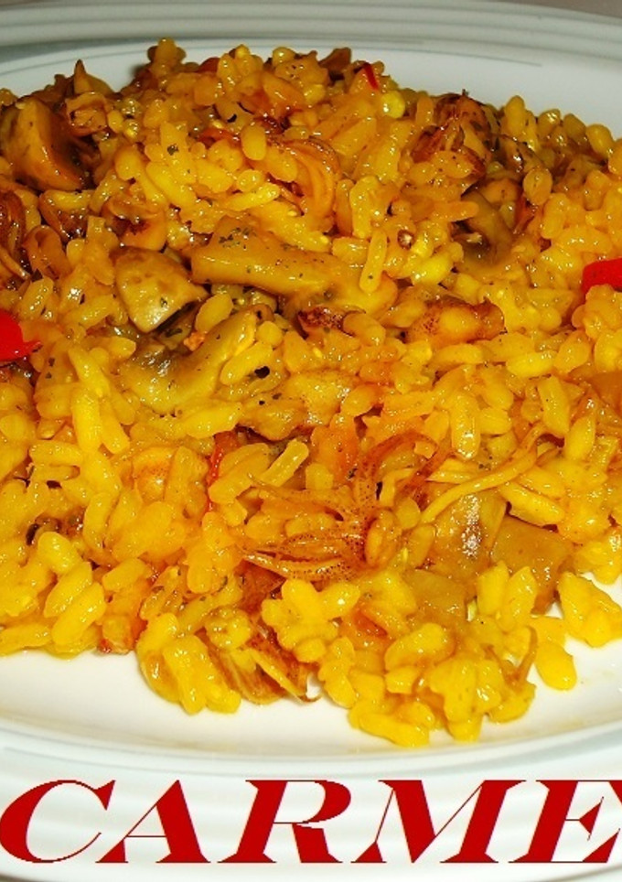Una foto de Arroz con chipirones y champiñones