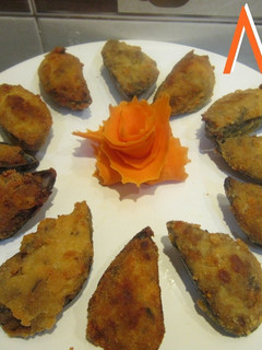 Una foto de Mejillones tigres