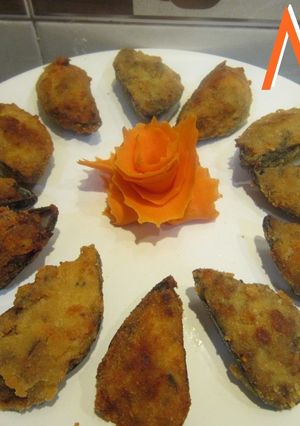 Una foto de Mejillones tigres