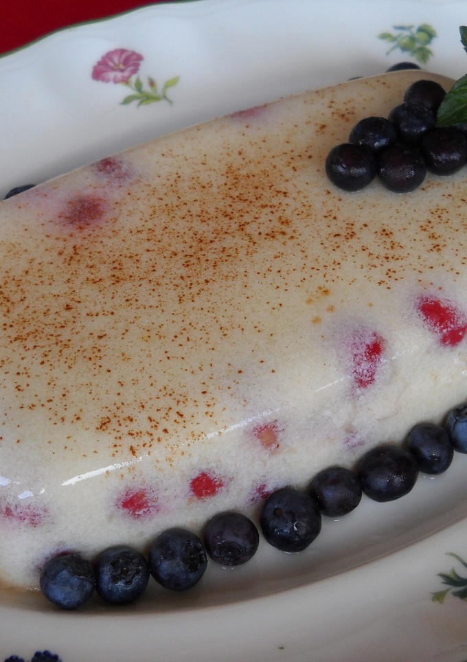Una foto de Flan de requesón con frambuesas