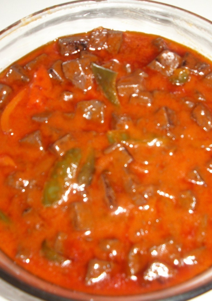 Una foto de Sangre frita con pimientos y tomates de Lorca