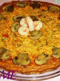 Una foto de Pastel de gambas y champiñones