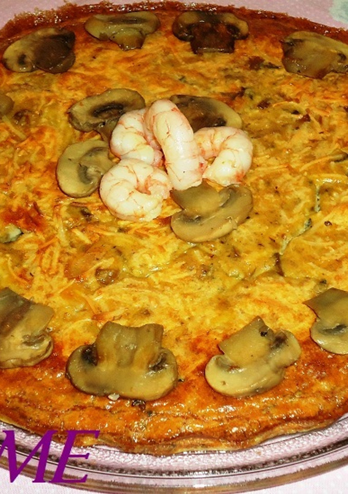 Una foto de Pastel de gambas y champiñones
