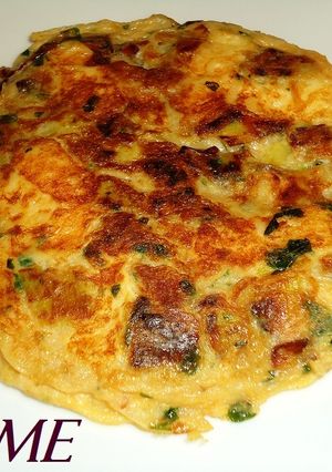 Una foto de Tortilla de queso brie y puerros