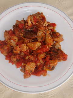 Una foto de Pollo y magro con tomate frito natural