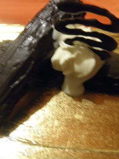 Una foto de Alfajores de vainillas con baño de chocolate