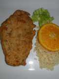Milanesas de pavo con arroz a la naranja