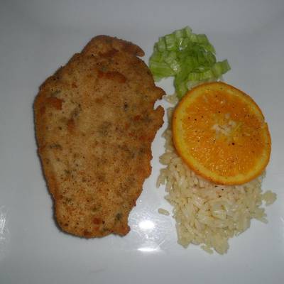 Milanesas de pavo con arroz a la naranja Receta de Gabriela Diez- Cookpad