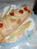 Arrollado de pionono relleno de jamón, nueces y espárragos blancos