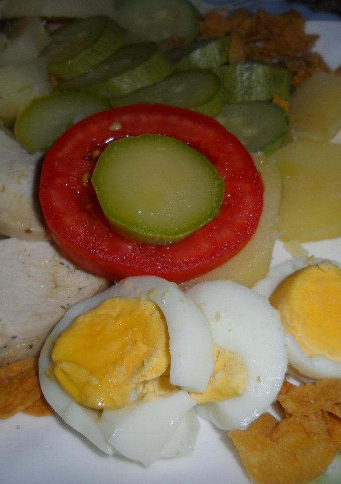 Una foto de Verduras con pollo y cereales en salsa de yogurt
