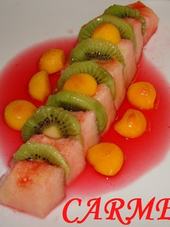 Una foto de Melón con salsa de granadina