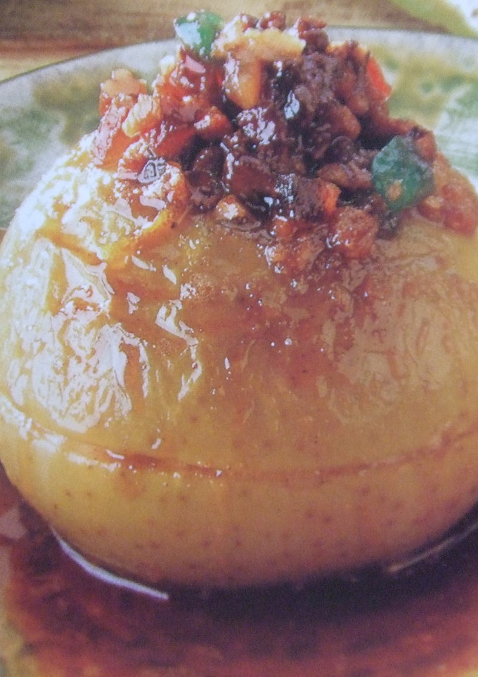 Una foto de Manzanas asadas con frutos secos y miel de romero