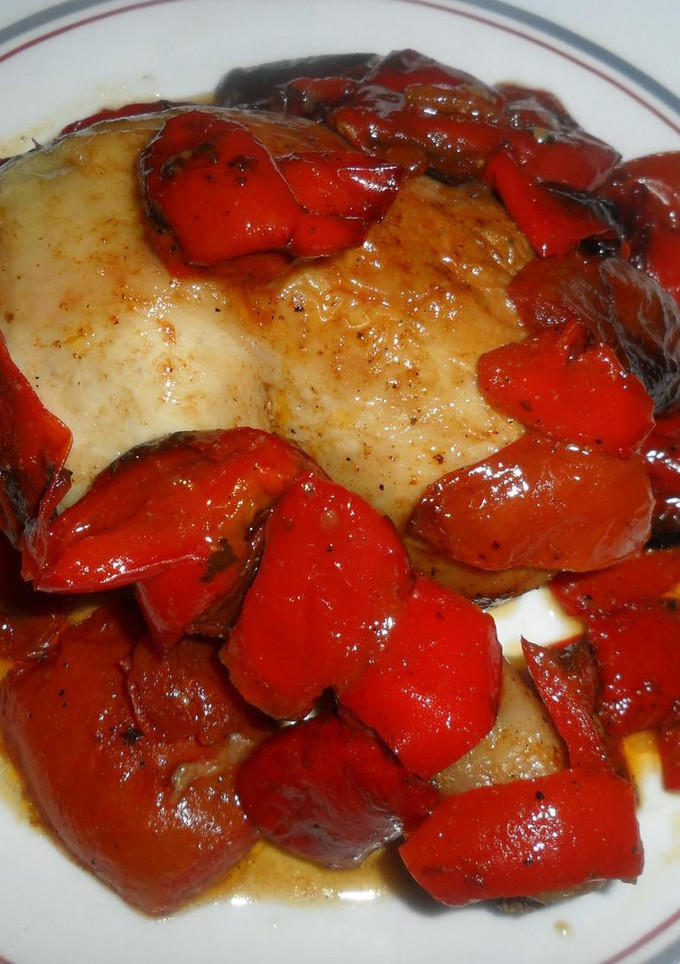 Una foto de Pollo entomatado al horno