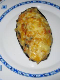 Una foto de Berenjenas rellenas de mejillones y gambas