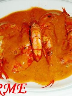 Una foto de Gambas en salsa al pimentón y cava
