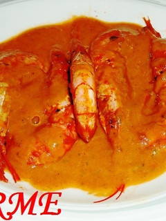 Una foto de Gambas en salsa al pimentón y cava