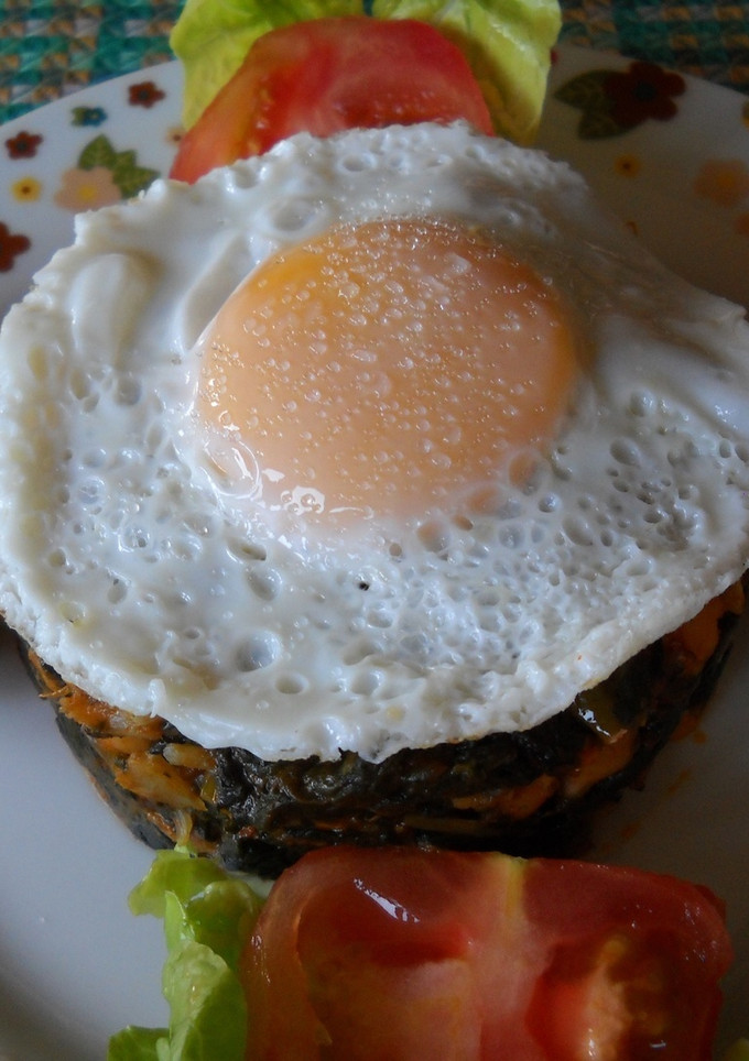 Una foto de Garbanzos guisados con espinacas y huevo