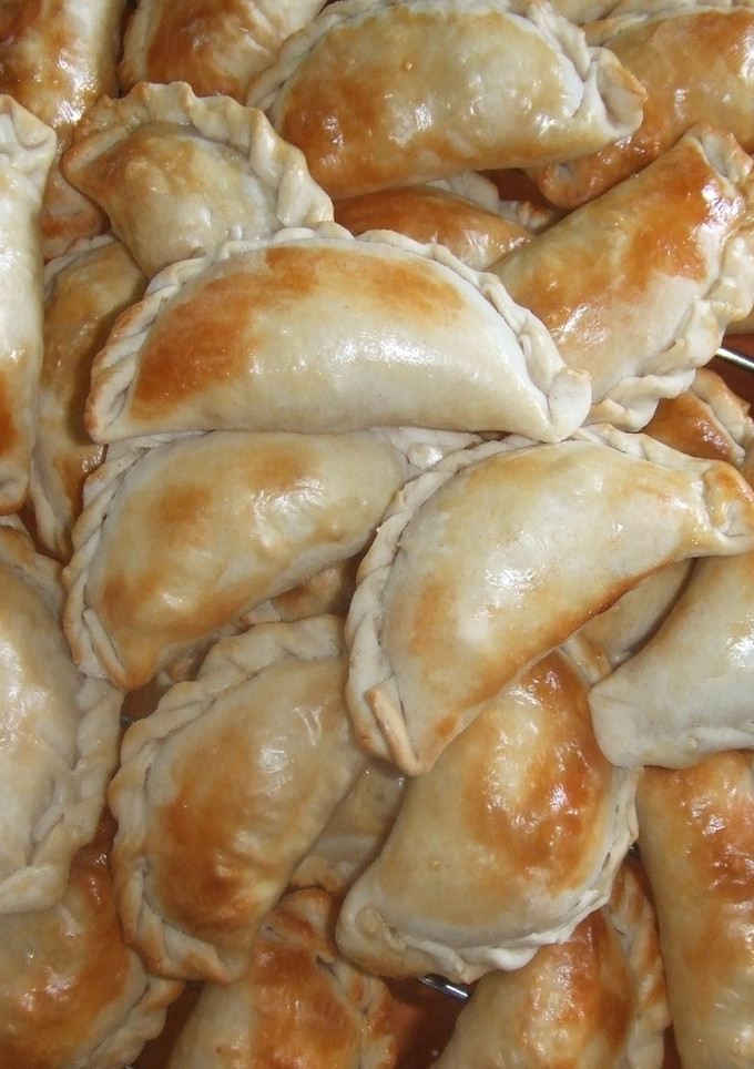 Una foto de Empanadillas rellenas de gorgonzola y parmesano