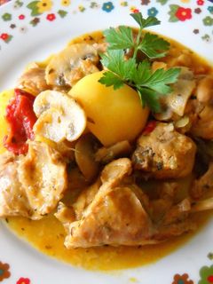 Una foto de Conejo en salsa de naranjas
