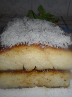 Una foto de Budín de pan con queso crema y coco