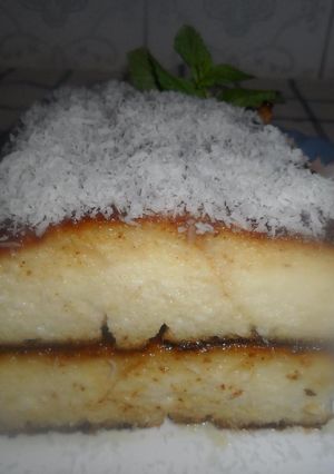 Una foto de Budín de pan con queso crema y coco