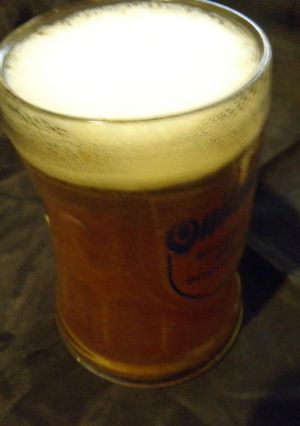 Una foto de Cerveza con coca cola