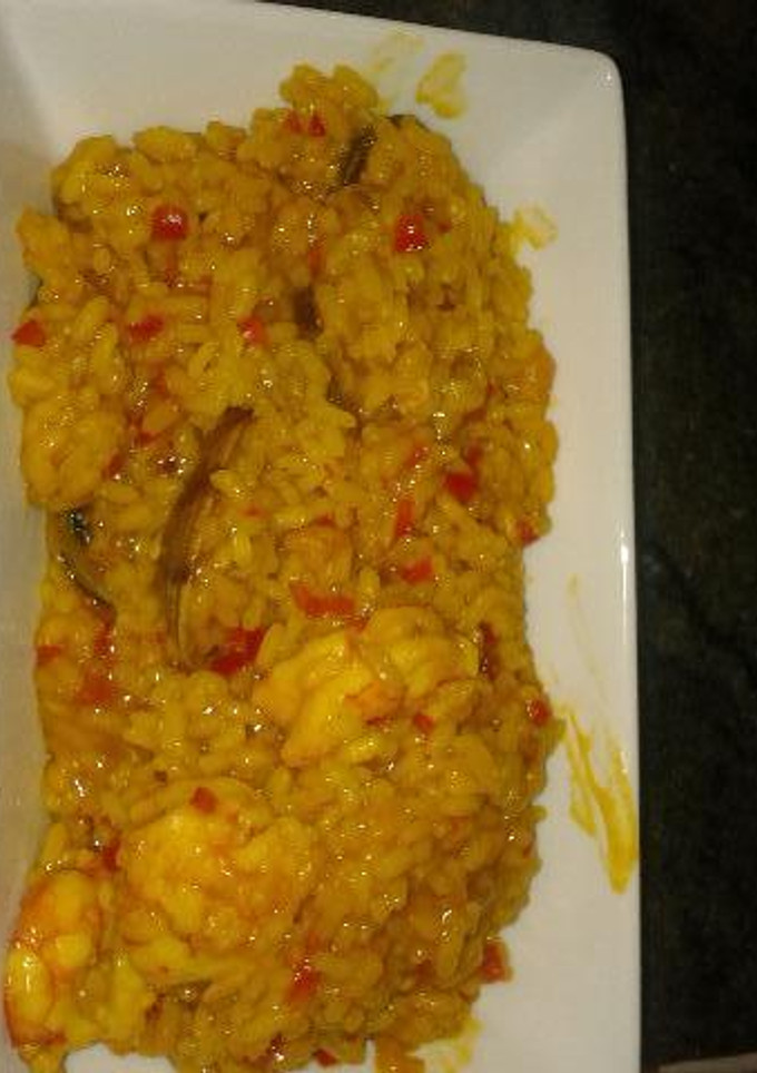 Una foto de Arroz con gambones y almejas de carril