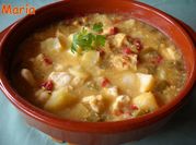 Una foto de rape con patata y almendra