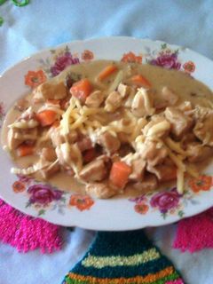 Una foto de Pollo en crema de champiñones