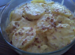 Una foto de Papas gratinadas con tocino de soya