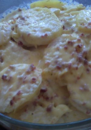 Una foto de Papas gratinadas con tocino de soya