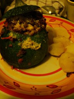 Una foto de Zapallo italiano relleno con papas doradas