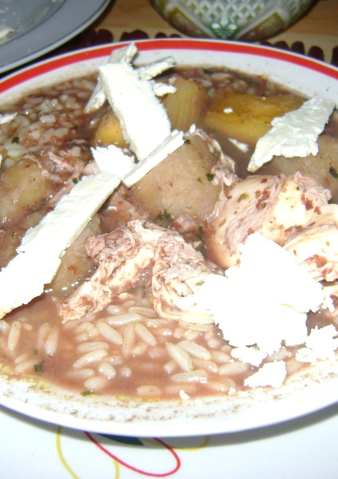 Una foto de Sopa de frijoles y queso