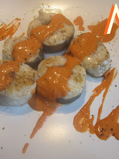 Una foto de Merluza con salsa de gambas al coñac