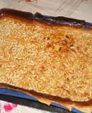 Empanada de arroz con piñones al horno
