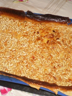 Una foto de Empanada de arroz con piñones al horno
