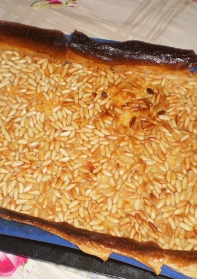 Una foto de Empanada de arroz con piñones al horno