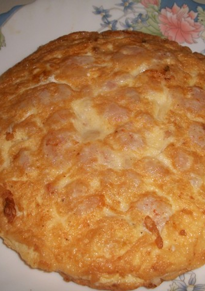 Una foto de Tortilla de gambas al ajillo